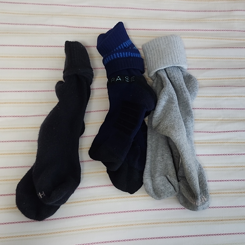 Navy blue, grey, and black socks